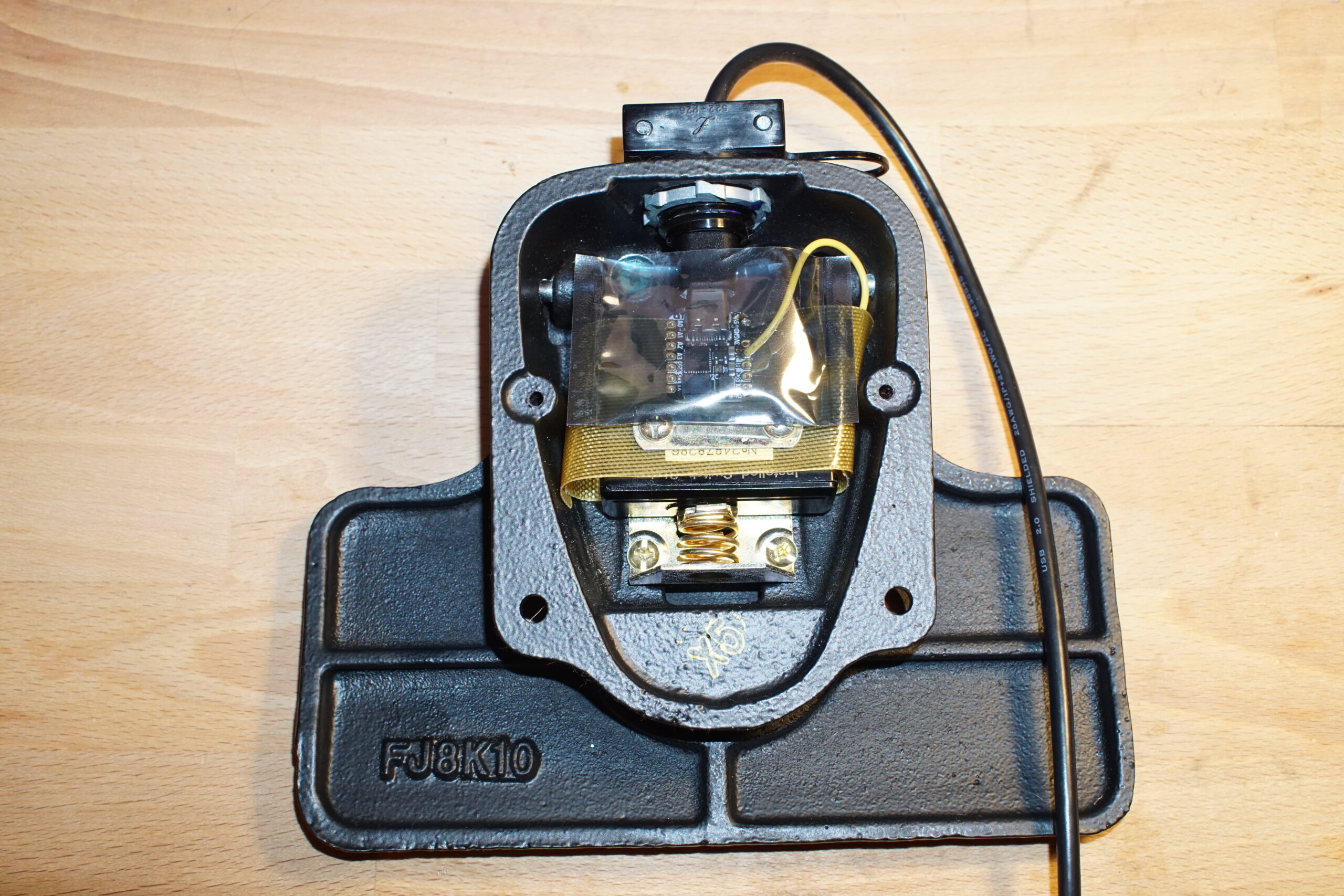 Image of footswitch internals with microcontroller connected.